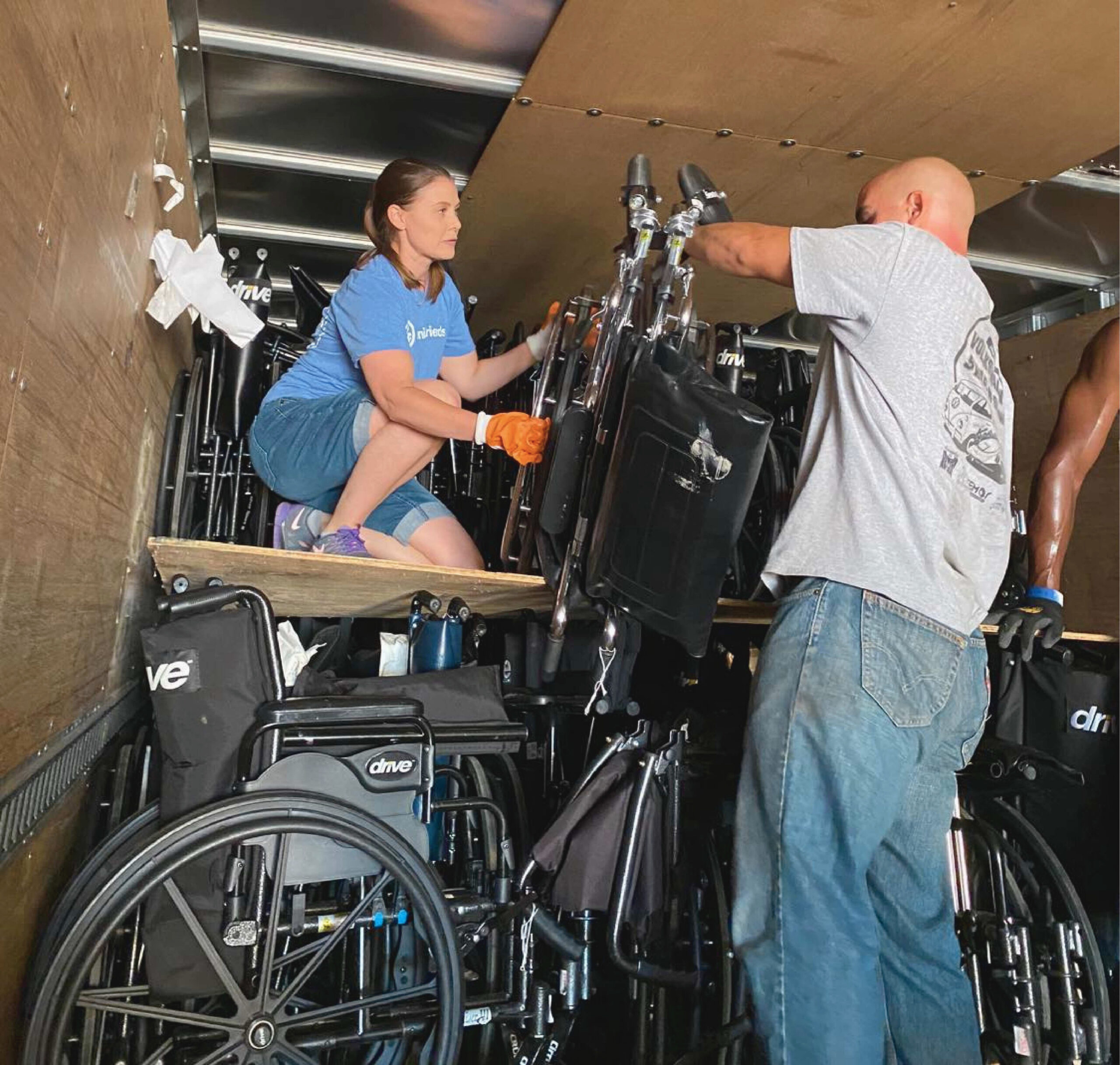 Jennifer Evans assembling a wheelchair during the Wheels for the World outreach